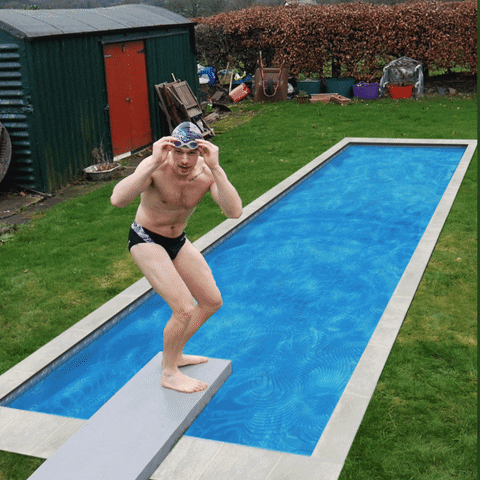 A man jumping into a pool, but the pool turns out to be a static image, and he lands on top of it